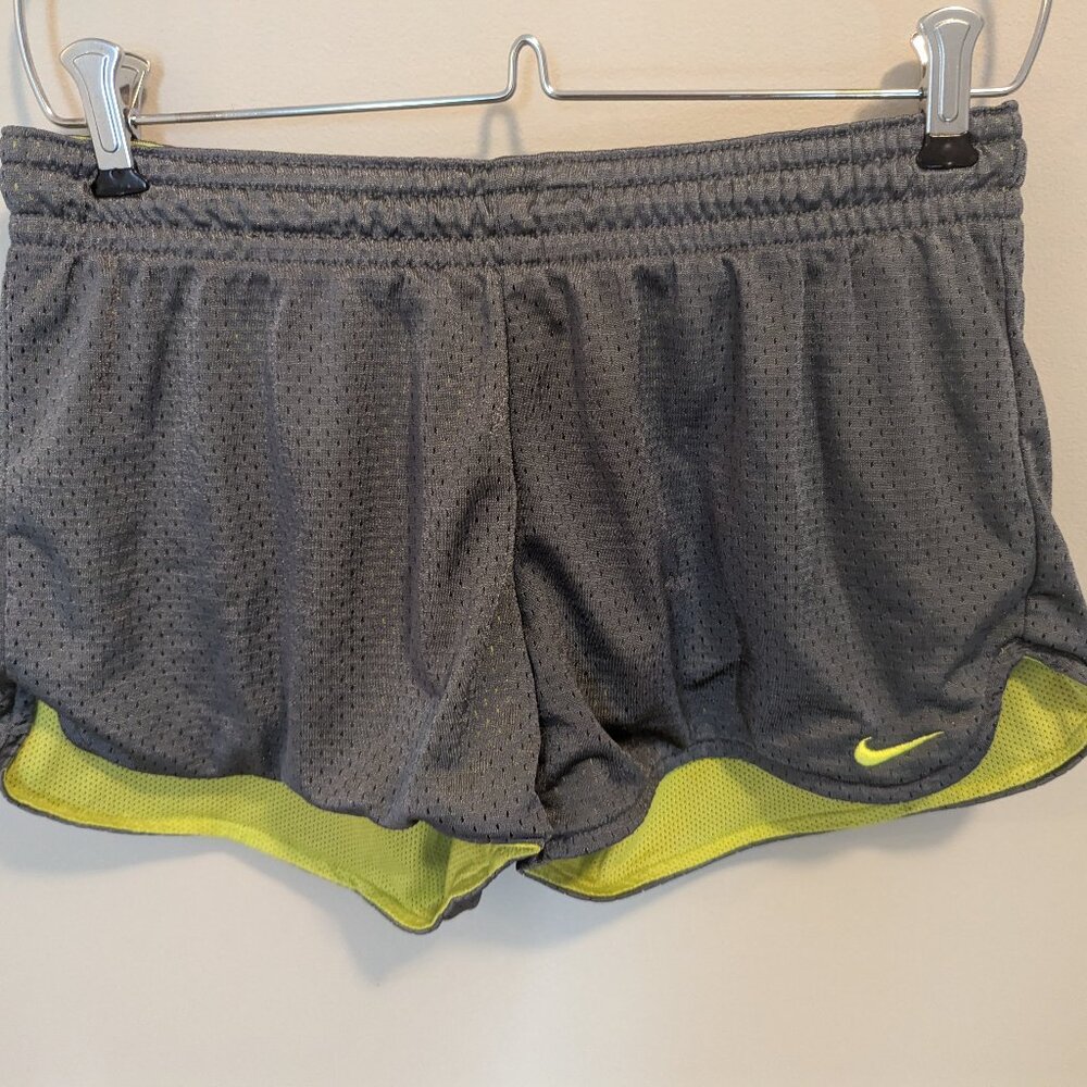 Grey and neon yellow Nike running shorts, Size S